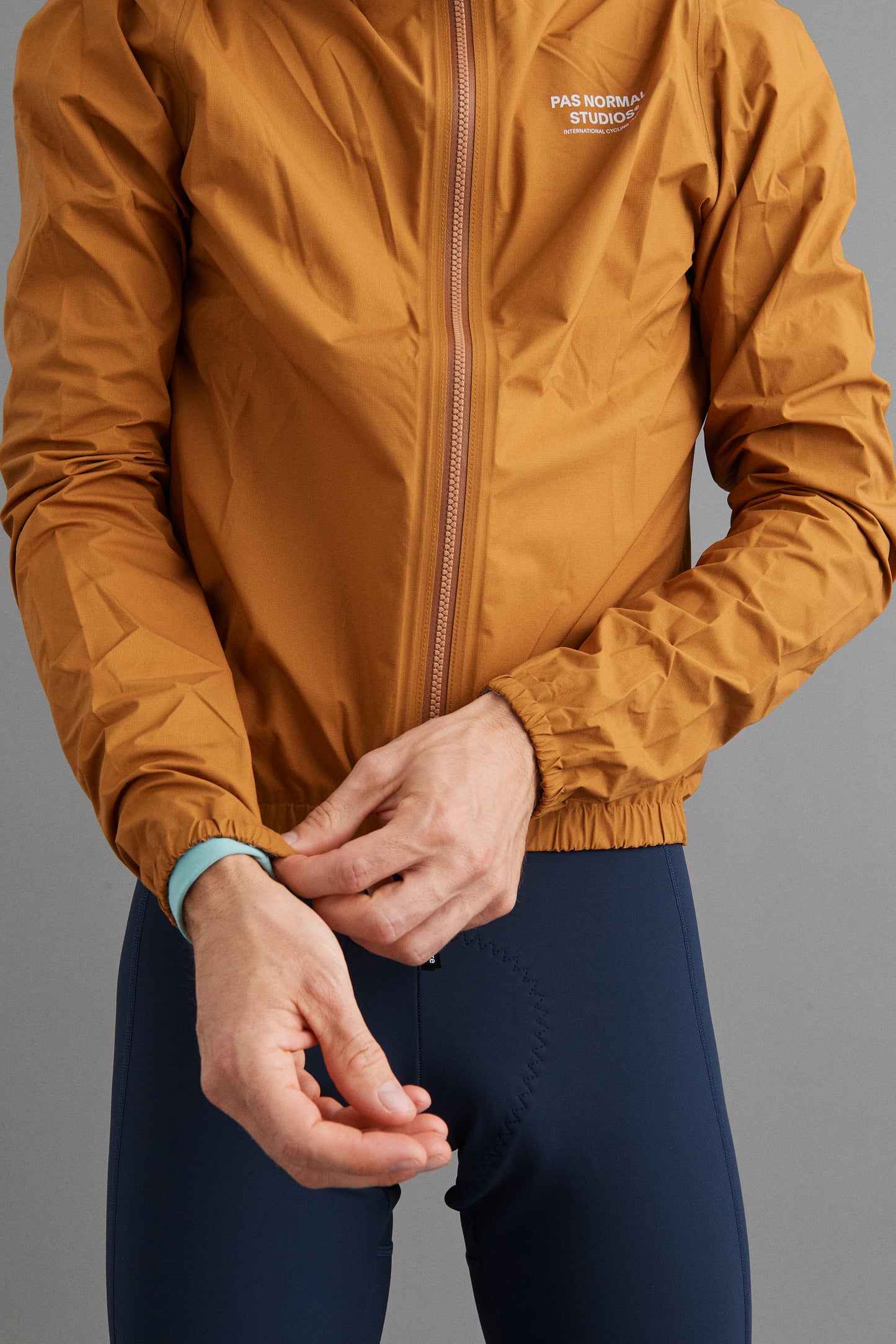 PAS NORMAL STUDIOS Mechanism Pertex Rain Jacket - Burned Orange