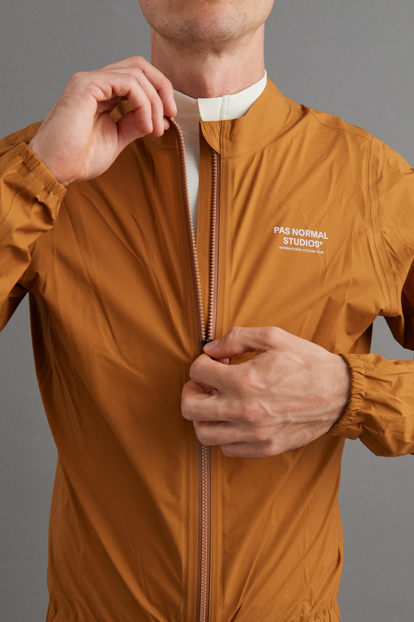 PAS NORMAL STUDIOS Mechanism Pertex Rain Jacket - Burned Orange