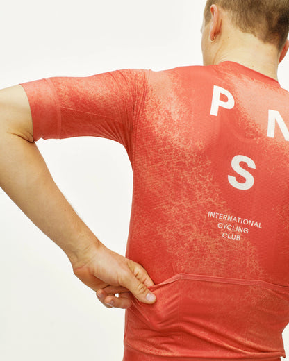 PAS NORMAL STUDIOS Mechanism Jersey - AOP Hibiscus Orange
